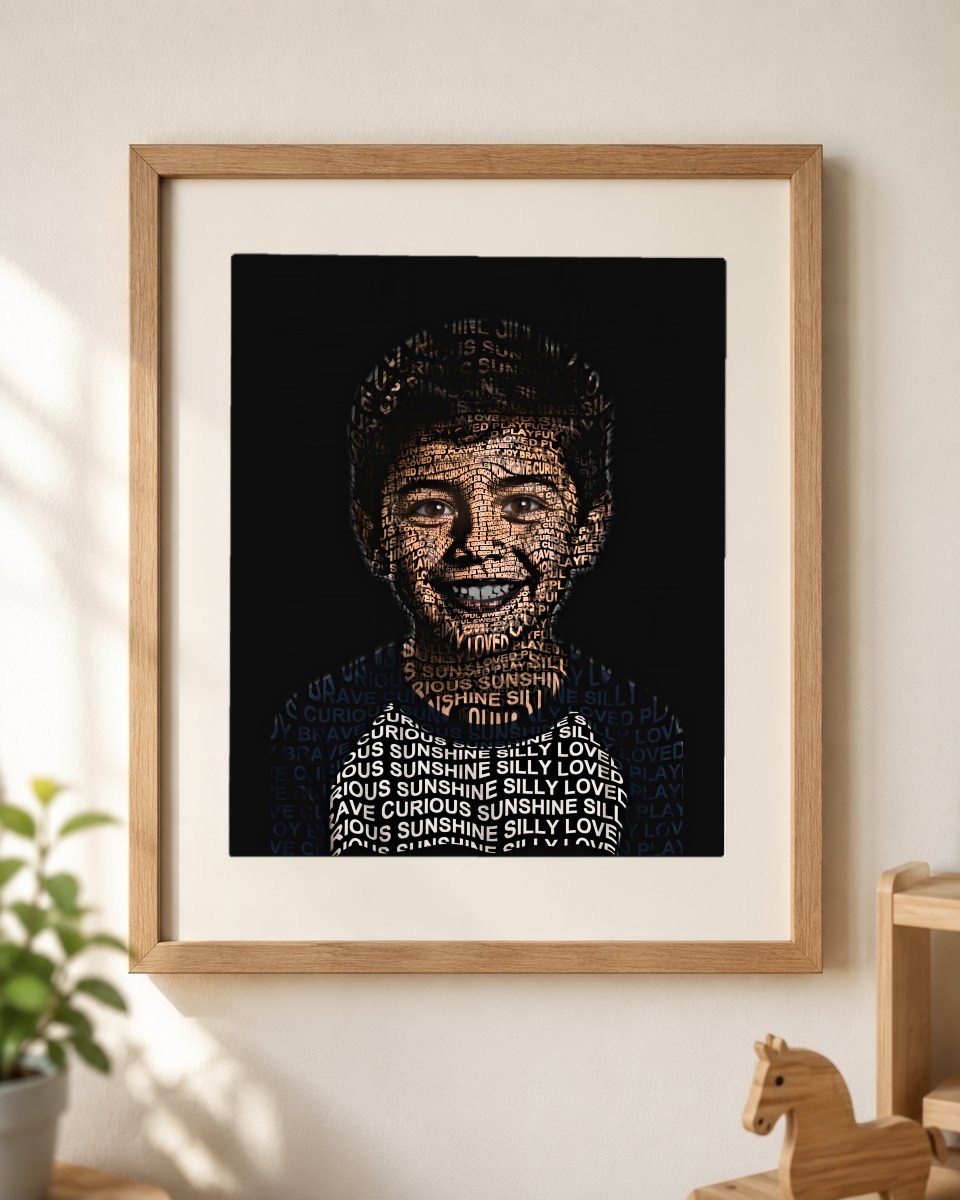 Framed word-art portrait of a child, matted in a light-oak frame on a wall